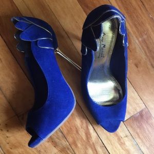 Blue stilettos with golden trim